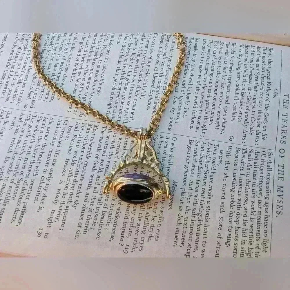 Vintage goldtone necklace with swivel charm 3 different  stones colours